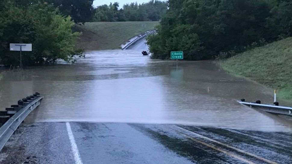  Cibolo Creek bridge closed with 10 feet of water on road 