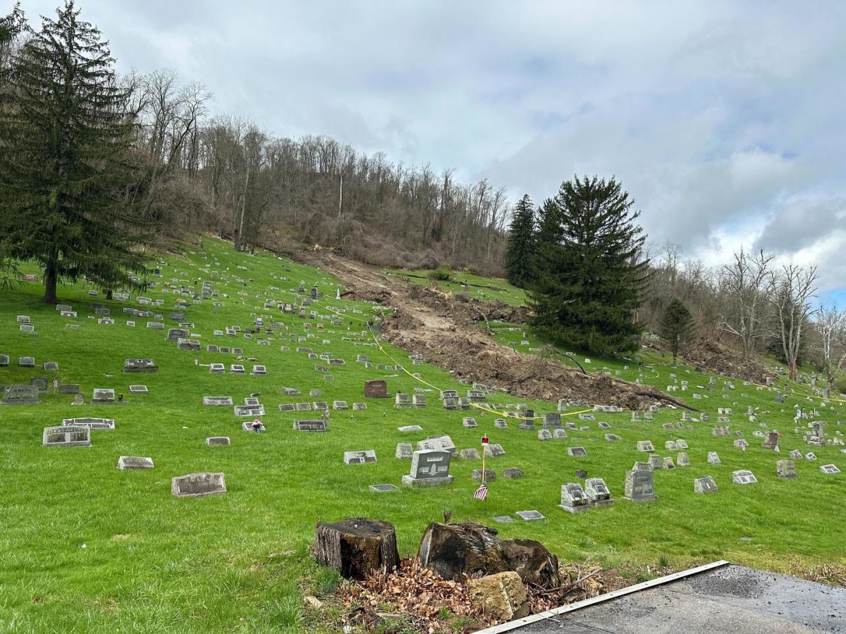  Mudslide washed out about 100 tombstones at West Virginia cemetery 