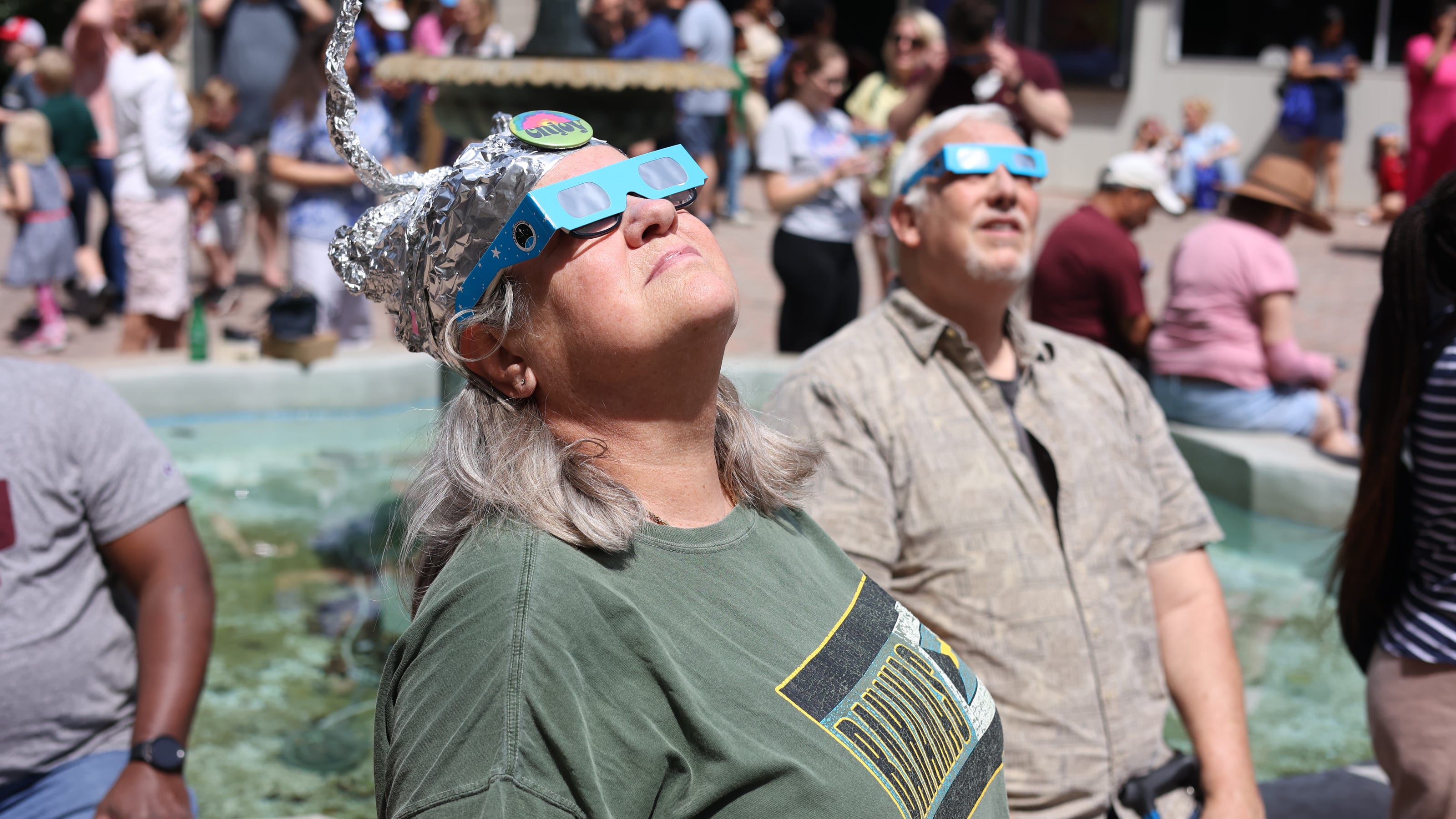  Hundreds gather downtown at Kleman Plaza to watch the solar eclipse in Tallahassee 