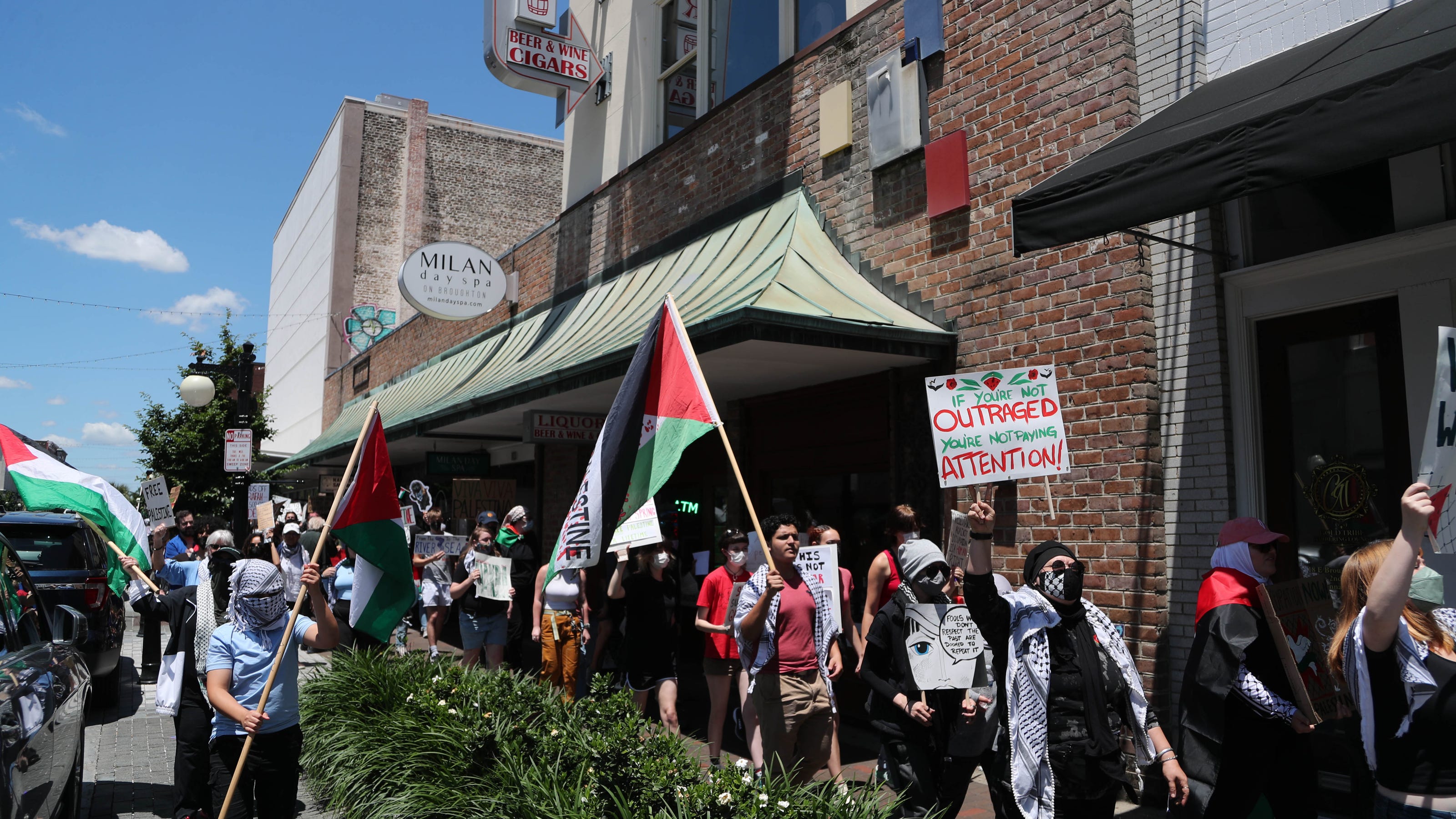   
																More than 100 pro-Palestinian protestors gather and march around downtown Savannah 
															 