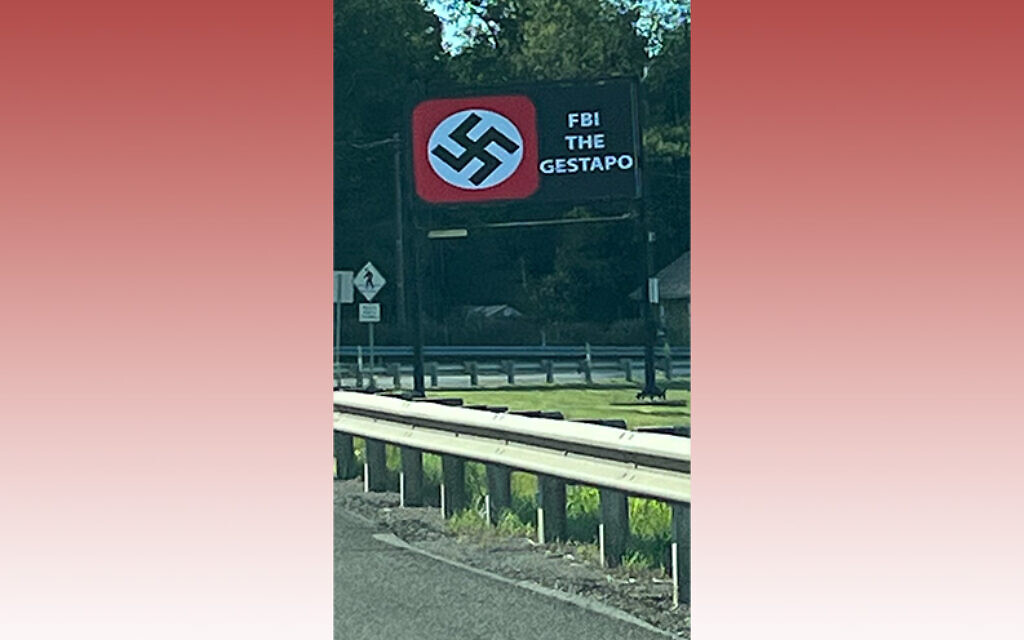  Worthington businessman unapologetic for billboards featuring Nazi flag 