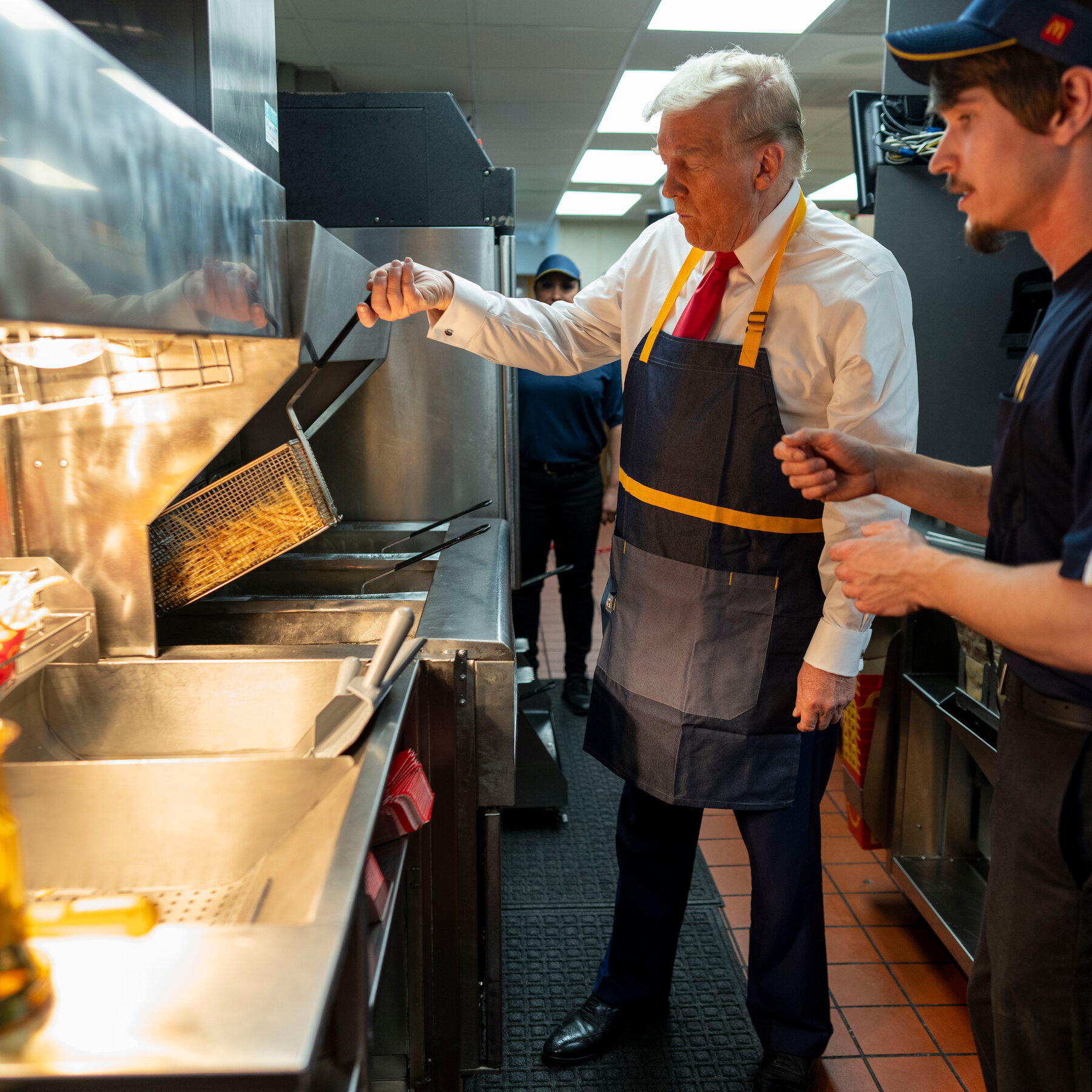  As Trump Served Up McDonald’s Fries, Vitriol Boiled Outside 