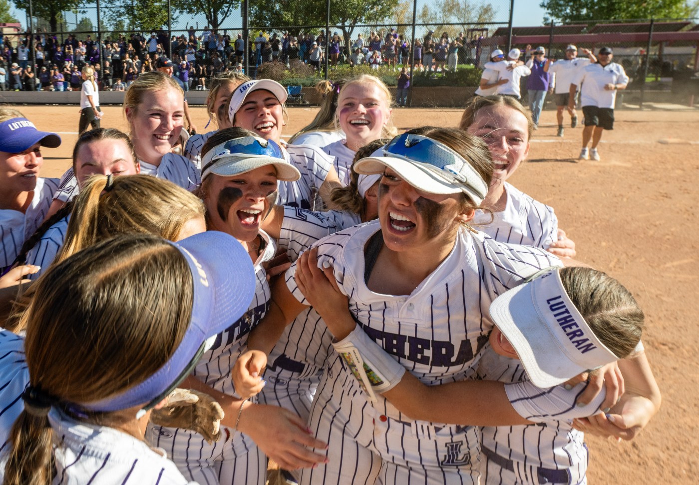   
																Lutheran wins Class 4A softball crown for fourth straight title as Annie Schroeder pitches Lions to 1-0 win over Windsor 
															 