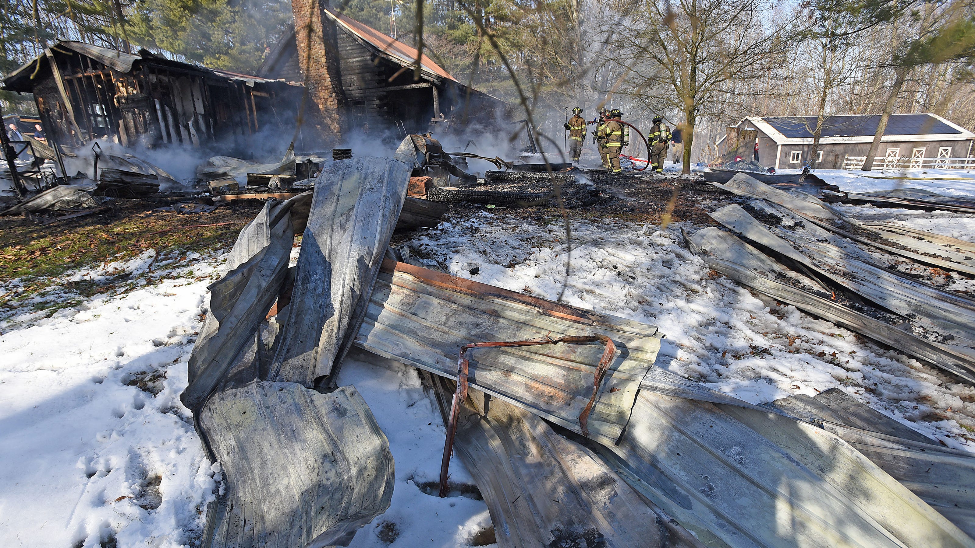  Fire heavily damages Bellville log cabin; no injuries reported 