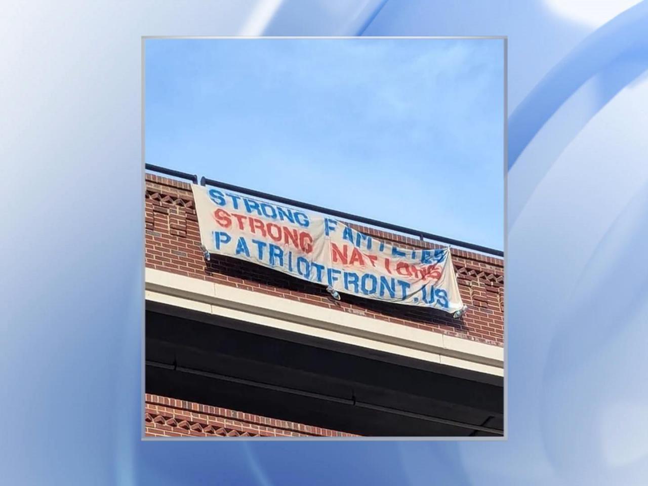  Authorities investigating sign from hate group hung from American Tobacco Campus 