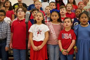  Heights elementary school honors veterans with musical ceremony 