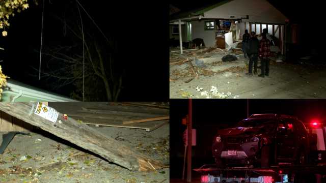  SUV crashes into power pole, garage: one dead 