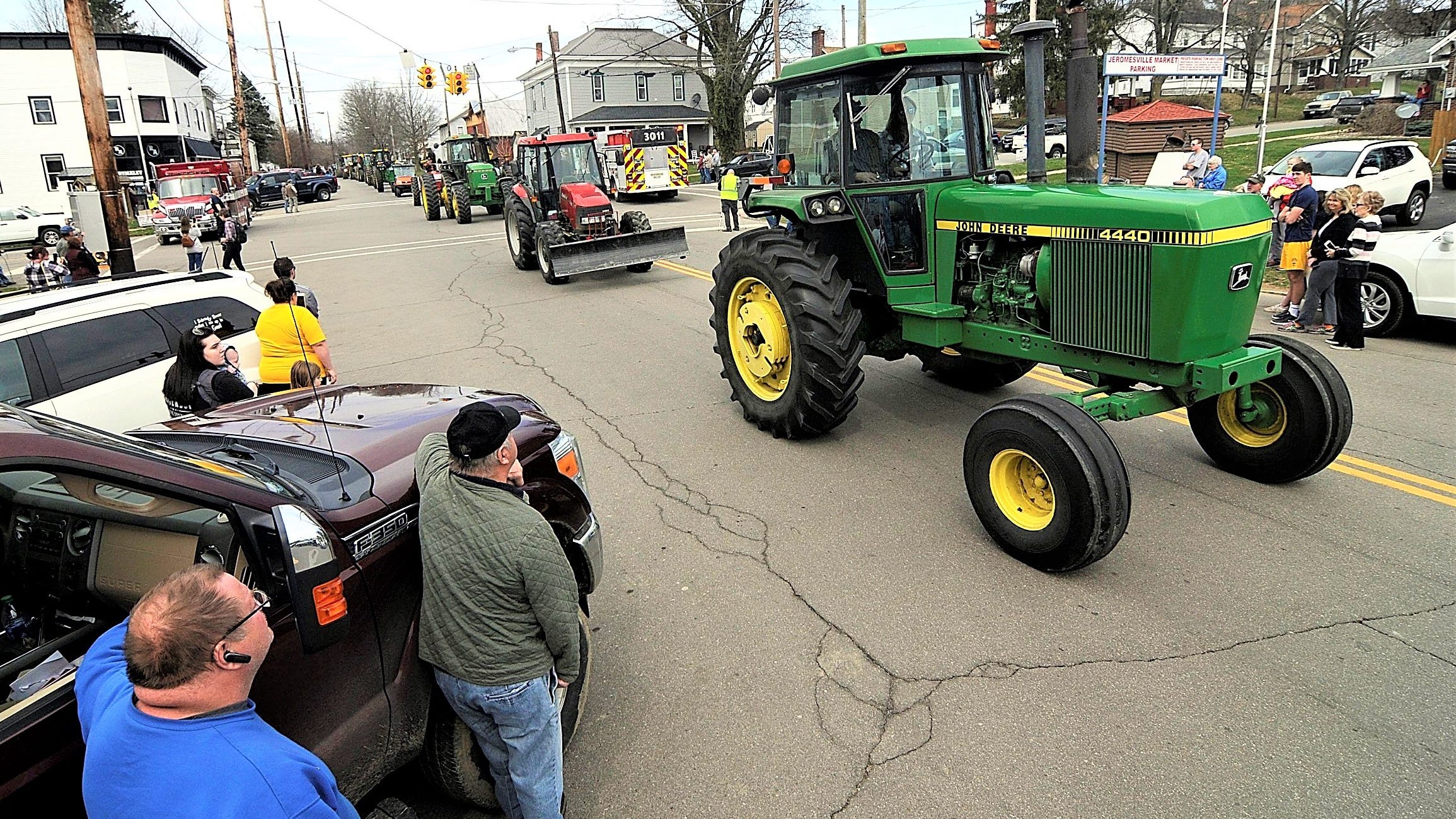  Remembering a 'Deere' friend: Village's tractor procession honors area farmer 