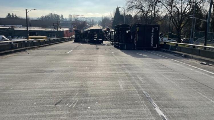  Semi-truck rolls, loses load of aluminum on I-5 off-ramp in Seattle 