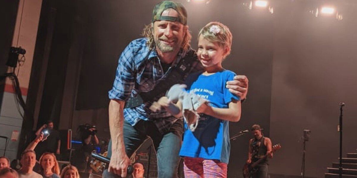  True definition of a Riser: Local pediatric cancer patient serenaded by country star 