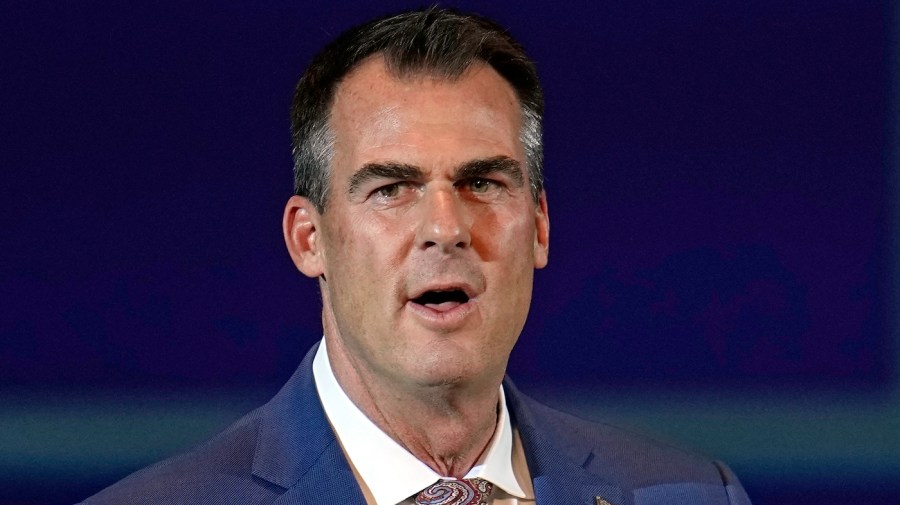  Stitt fires member of cabinet over court appearance 