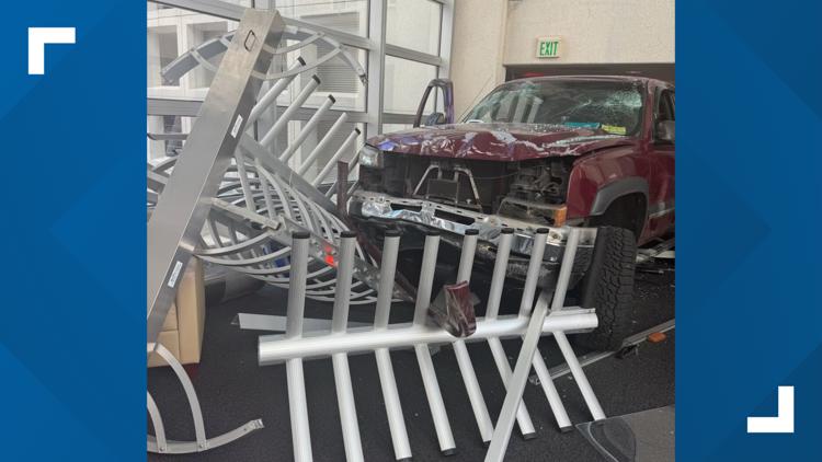  Driver detained after truck crashes into Tampa bank 