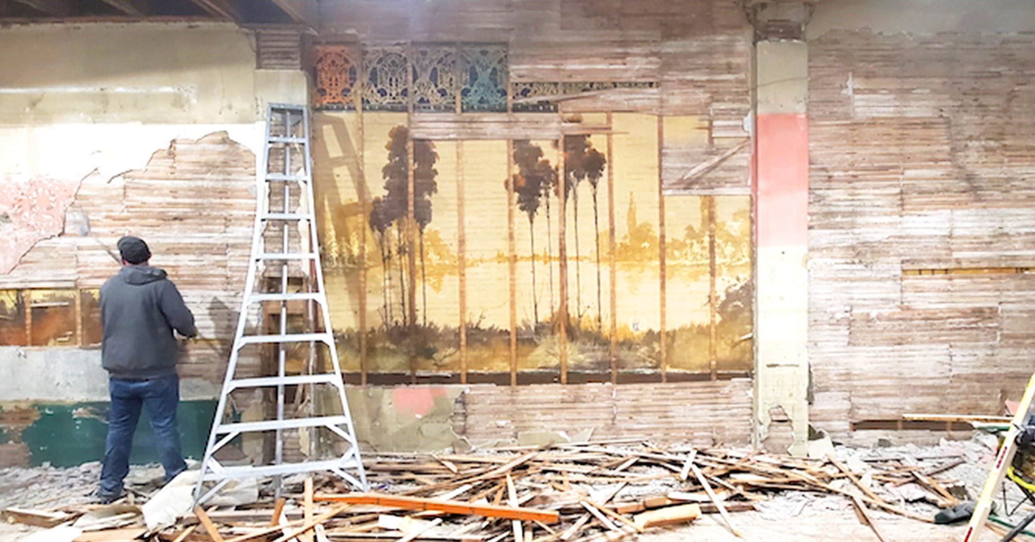  Couple Renovating Dilapidated Old Building Stumble on 60-Foot Century-Old Murals Hidden Behind the Walls 