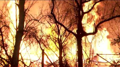  Massive wind-fueled fire burns for hours at Baltimore lumber yard 