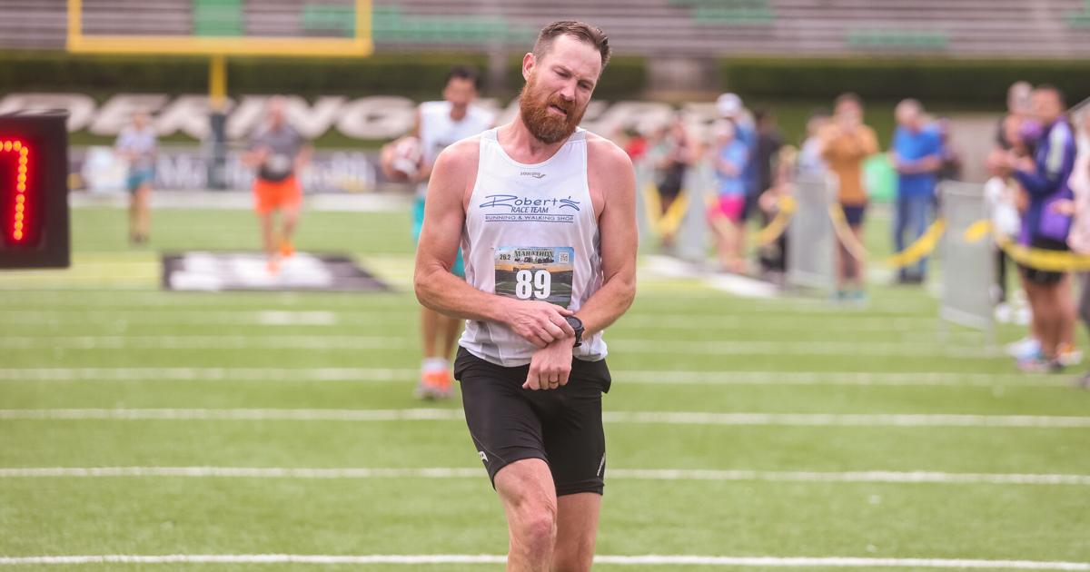  Running shop owner wins Marshall University Marathon 