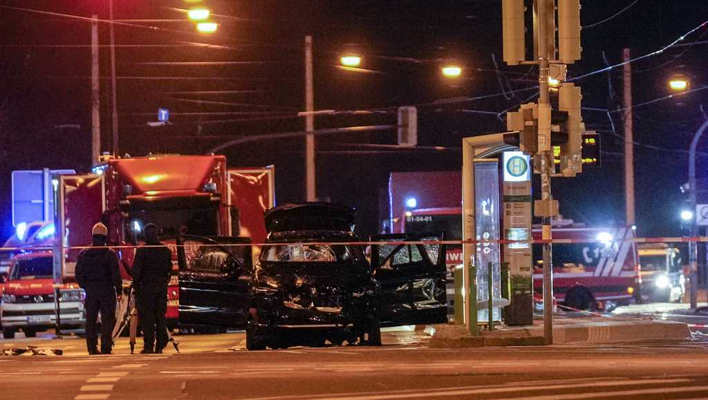  At least 2 dead and 60 hurt after a car drives into a German Christmas market in a suspected attack 