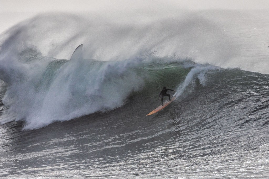  Accomplished, thrill-seeking surfers test themselves as massive swell blasts Central Coast 