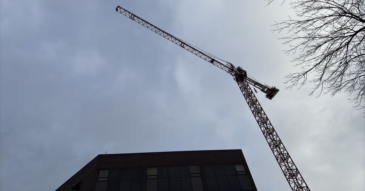  Two men arrested after parachuting off crane in downtown Raleigh, police say 