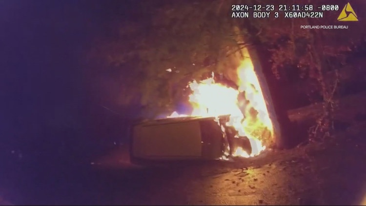  First responders work to pull trapped driver from flaming wreck in Southeast Portland 