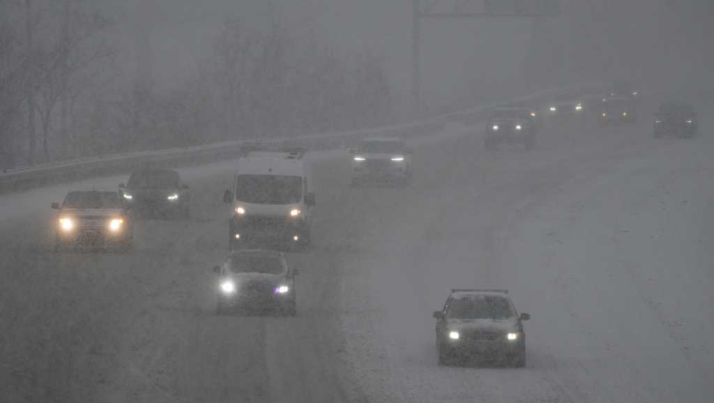  Storm brings snow and ice, causing travel disruptions and school closures across US 