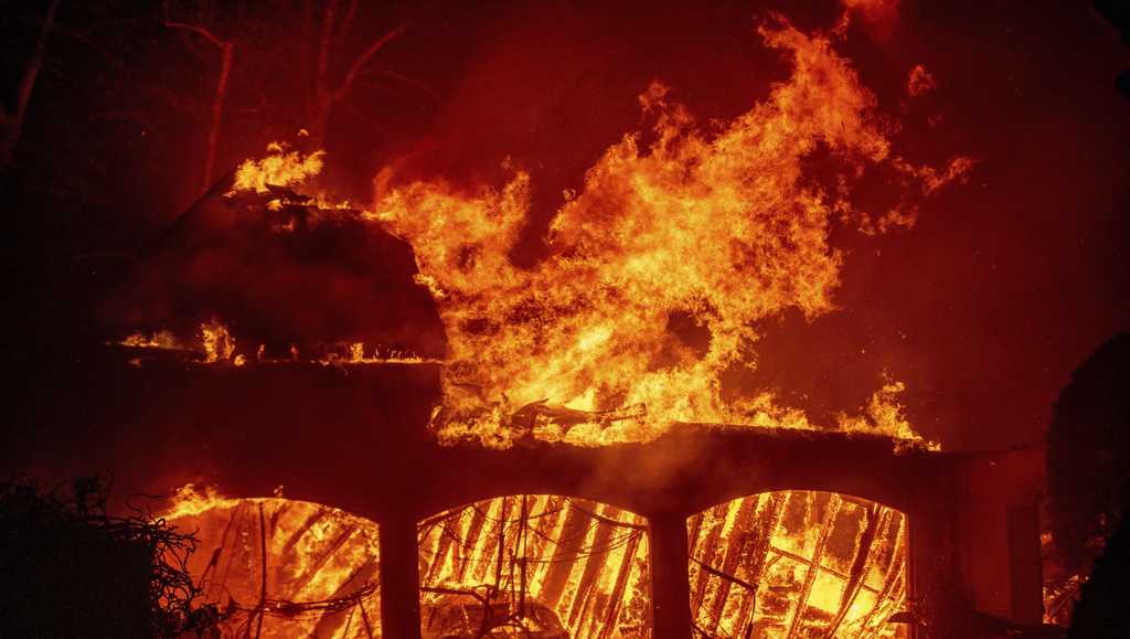  Out of control wildfires ravage Los Angeles; thousands flee as flames threaten homes 