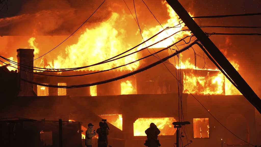  Firefighters battle to control devastating Los Angeles wildfires 