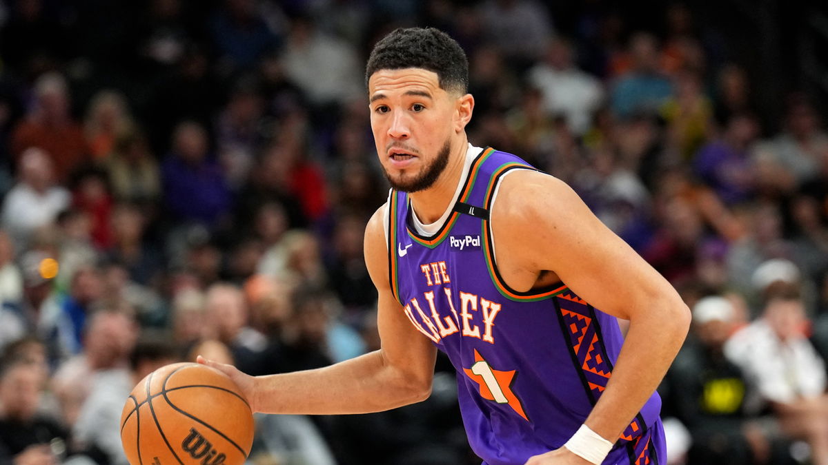  Booker Shines as Suns Hold Off Jazz for 114-106 Victory 