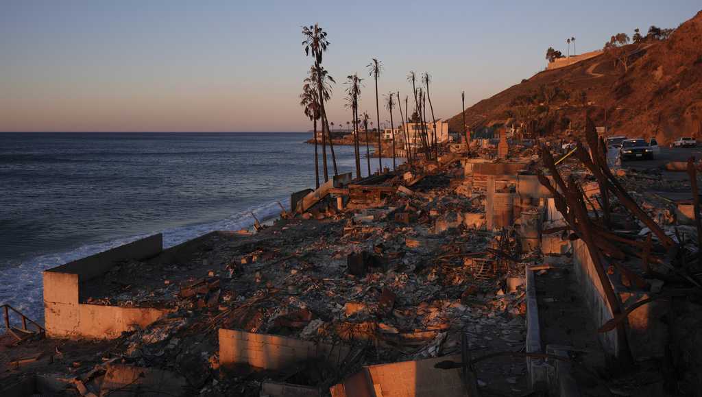  Fire-scarred Los Angeles braces for dangerous winds amid ongoing wildfire threat 