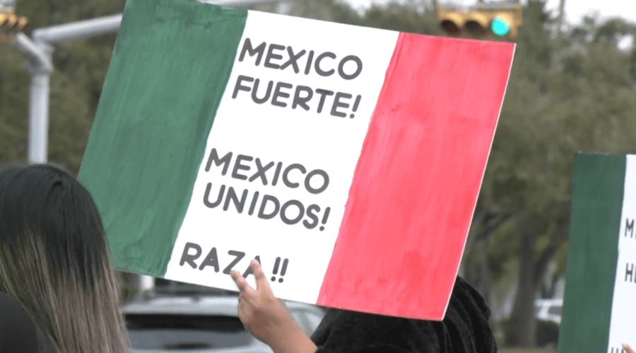  Protest group rallies against immigration raids 