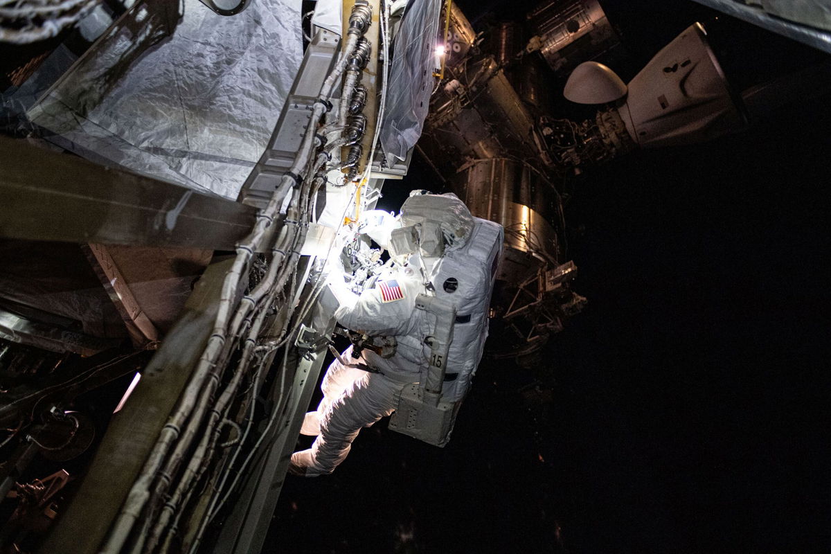  Boeing Starliner astronauts on extended stay at space station conduct a spacewalk 