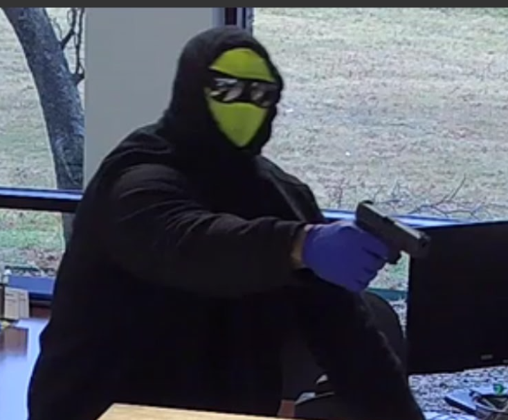   
																Man robs KCK bank at gunpoint; elementary school receives threat at nearly same time 
															 