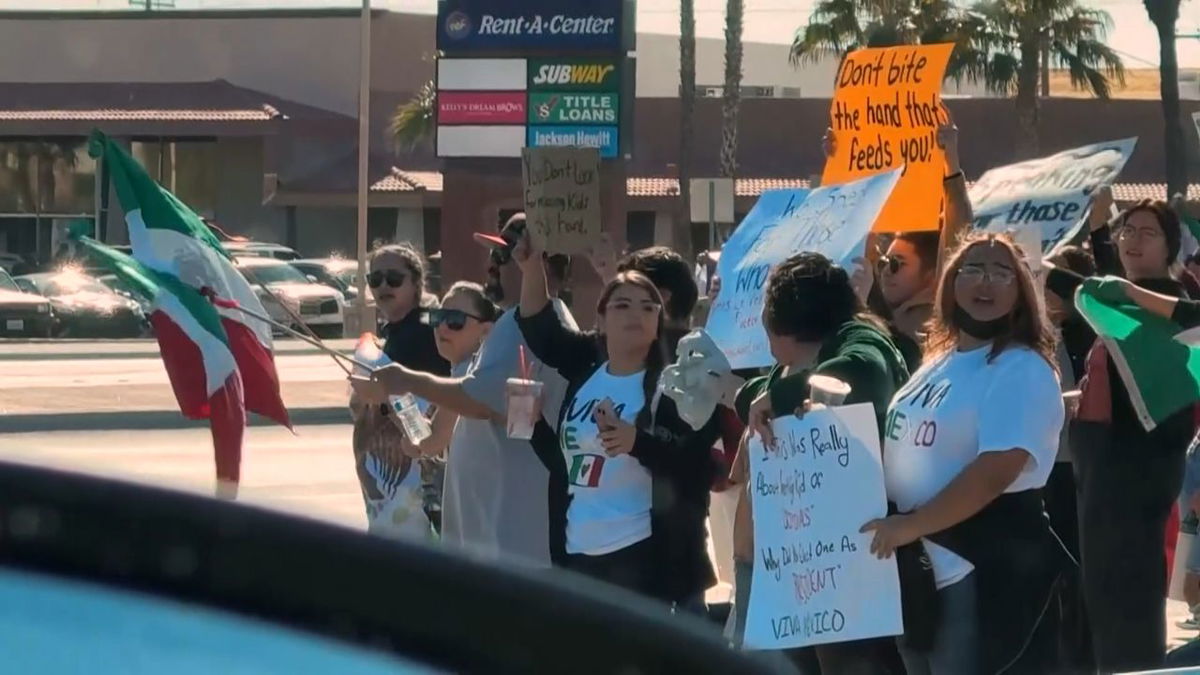  Dozens of locals protest ICE raids and immigration crackdown 