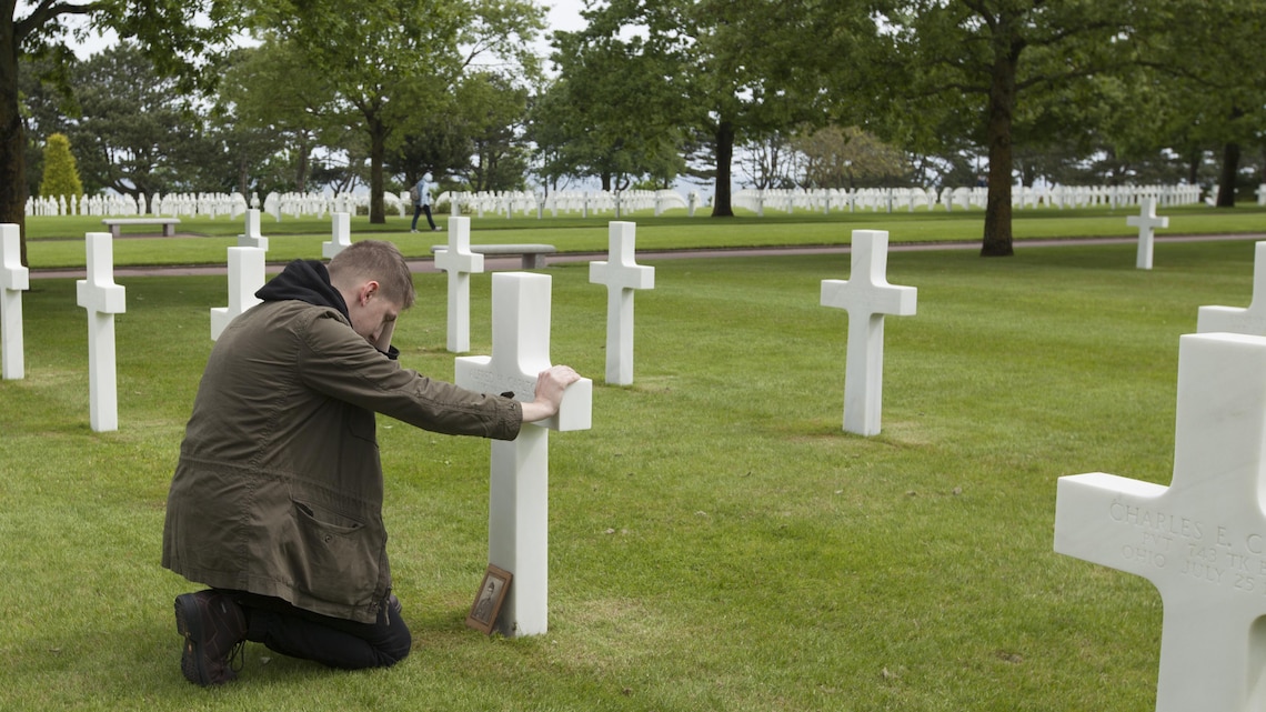  Marine visits gravesite of WWII family hero 