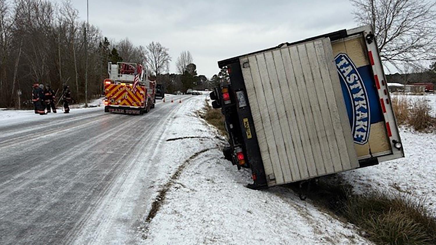  Second burst of snow coats icy roads throughout central NC after crash-filled morning 