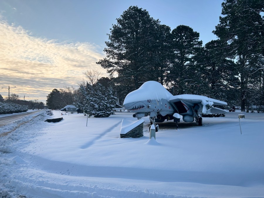   
																Photos: Naval Air Station Oceana plowing through snow on base 
															 