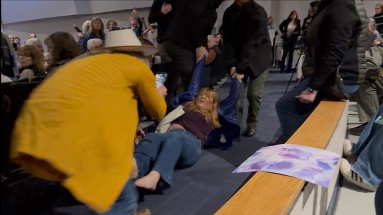  Legislative town hall in Coeur d'Alene turns chaotic as woman is forcibly removed 