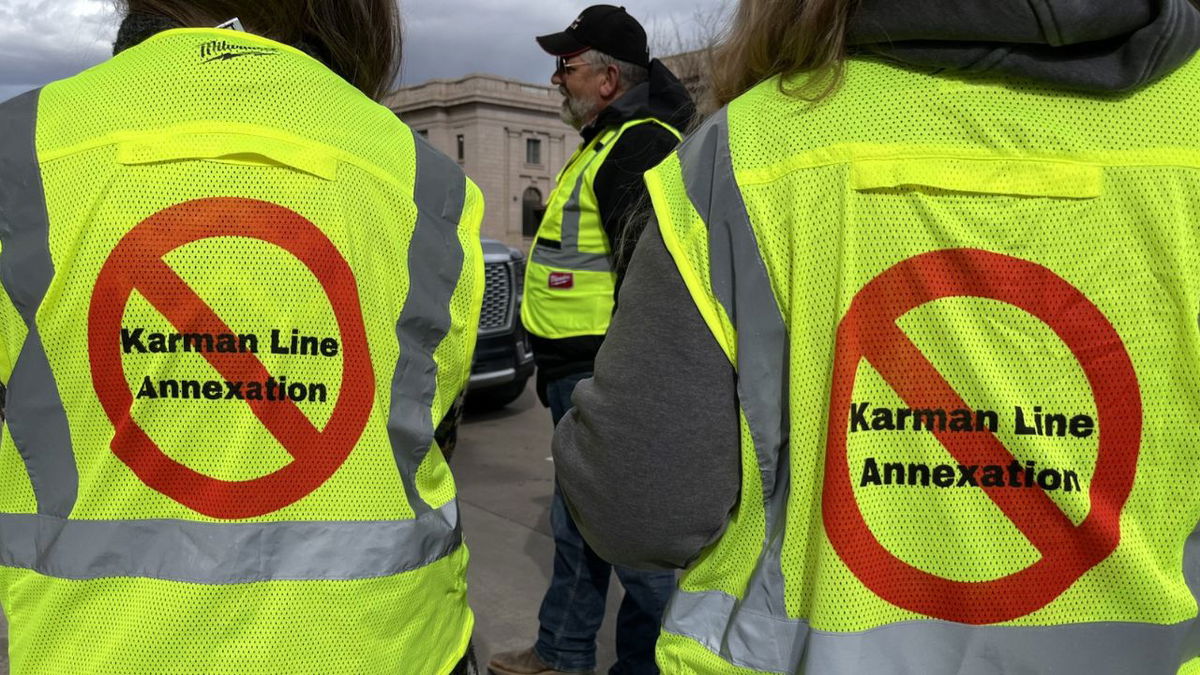  Colorado Springs residents against Karman Line annexation march petition straight to city hall 