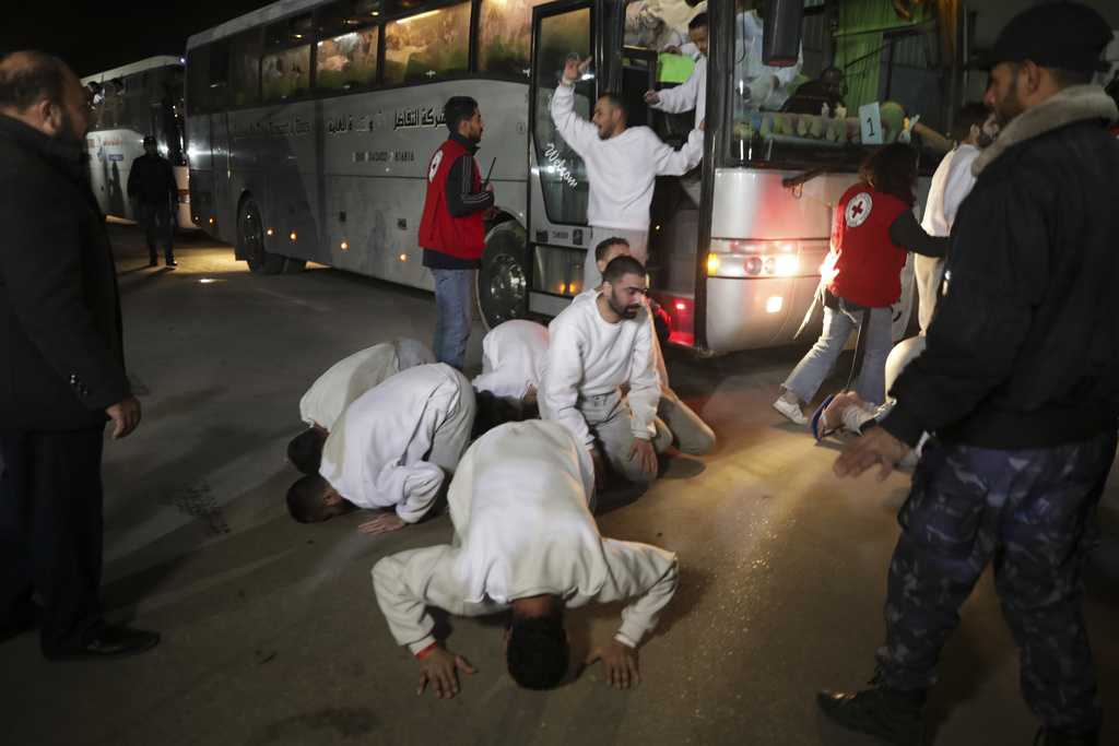  Hamas hands over bodies of 4 hostages to Israel as dozens of Palestinians leave Israeli prison 