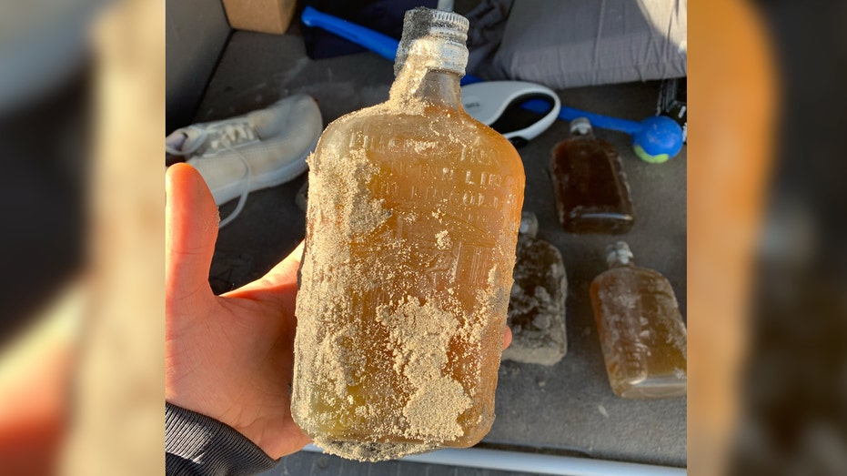  Rare and mysterious whiskey bottles found washed up on beach 