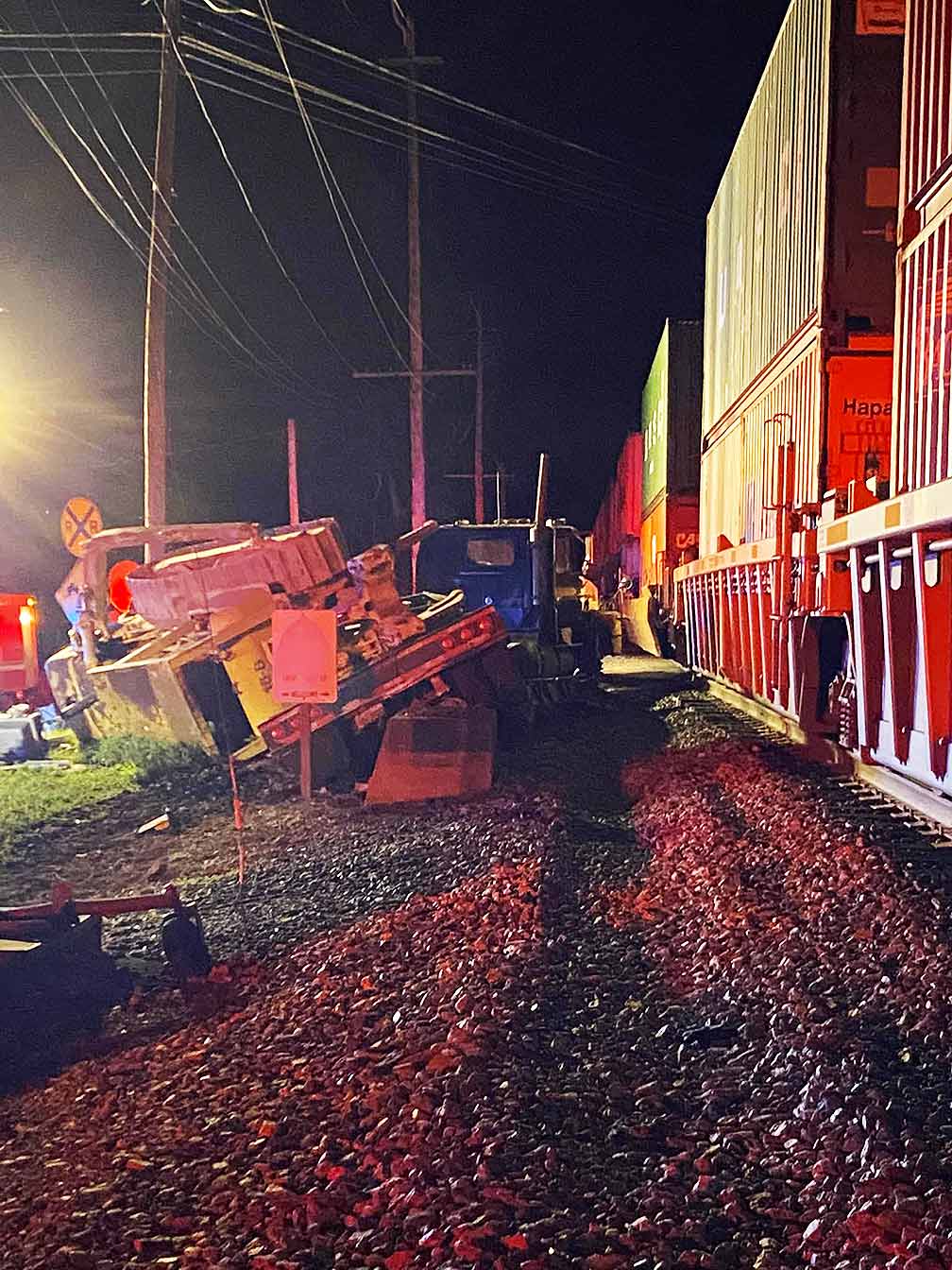  Train strikes tractor-trailer stuck on tracks in Virginia 